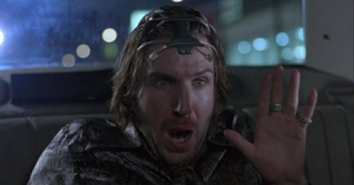 marshlands's tweet photo. let's get one thing straight. i will never buy those stupid tech goggles unless they are sold by a man that looks like this, asks me if i've ever jacked in, offers to connect me to the switchboard of the soul, calls himself the the magic man, the santa claus of the unconscious https://t.co/04O3qRUhU1