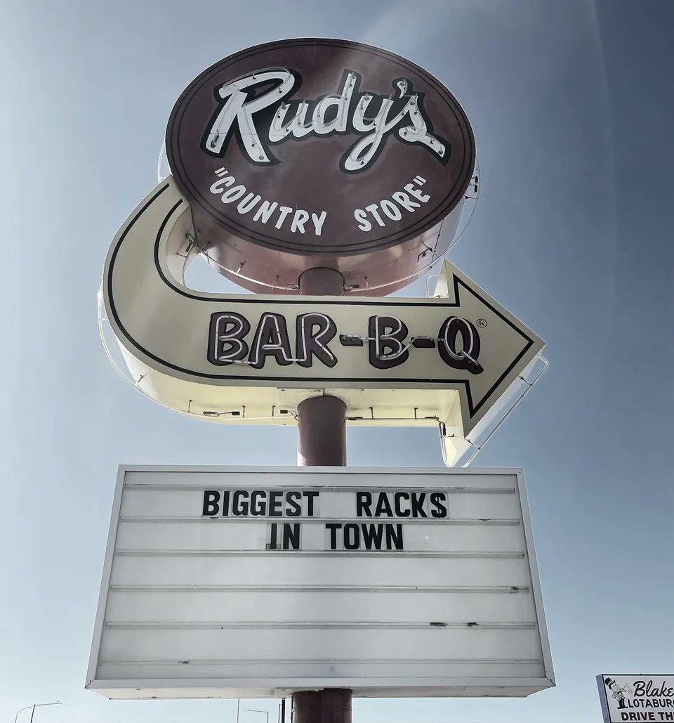 #theimginfo #computervision #letsgetwordy
— theIMG.info —
Rudy's 'COUNTRY STORE' BAR-B-Q BIGGEST RACKS IN TOWN 

#Sky #Signage #Billboard #Wheel #Sign #Advertising #Pole #StreetSign #Road 

— #MyStuff —
#Letsgetwordy #Ipulledoverforthis #Shotoniphone 
#Sig