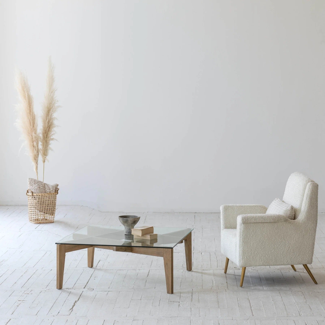 A gradual transformation from antique style to contemporary minimalism, the Cosimo Coffee Table features modern tones and architectural shapes.