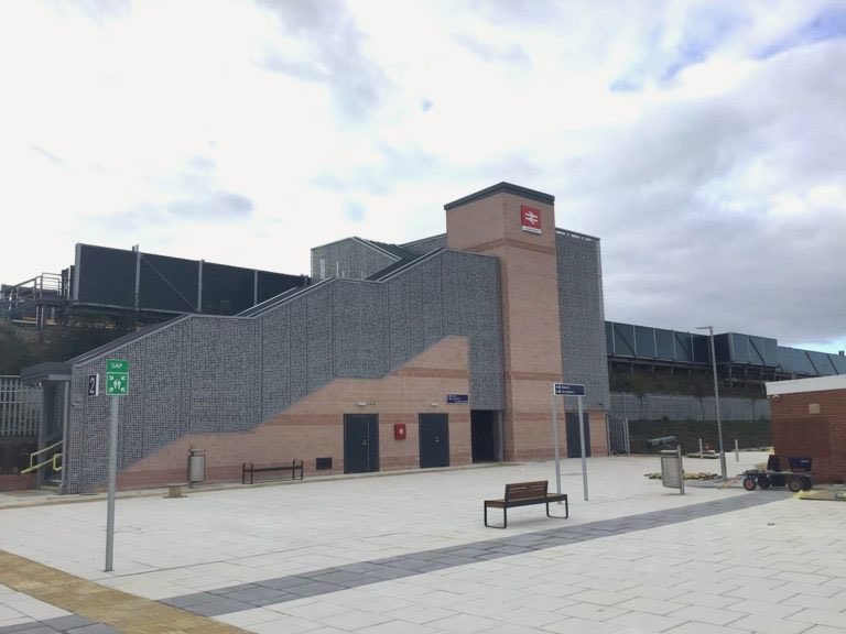This is a recently completed British train station. Value engineered to a level of comatose ugliness that dispirits & dulls the mind, dissuading passengers & degrading the trains that run through it. It is not civic or sociable architecture….