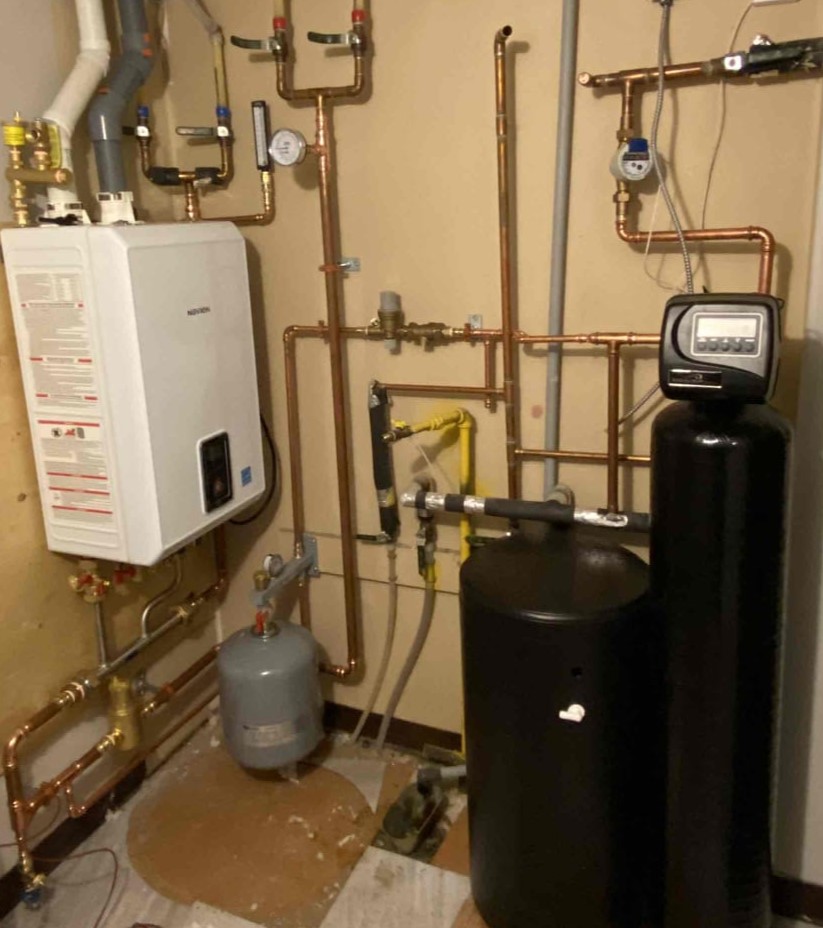 🏡 Exciting upgrade alert! In Horseshoe Valley/Carriage Hills condo, we're installing a Navien Combi boiler/tankless system with an Excalibur Water Softener for efficiency and comfort. Say goodbye to cold showers and appliance damage! Stay tuned for the final reveal. #Barrie