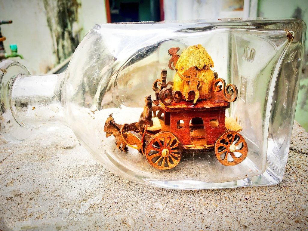 கண்ணாடி பாட்டிலில் தேங்காய் ஓட்டினால் செய்யபட்ட ரதம் #கைவினைபொருட்கள் #அண்ணாமலை #பாஜகதலைவர் #தமிழ்நாடு Unique handcrafted 🐎 cart inside unbroken glass bottle #crafts #நெல்லை #handmade #naturelovers