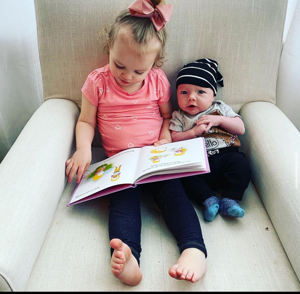 “They’re up and at it this morning. Ellie insisted on reading to her baby brother”