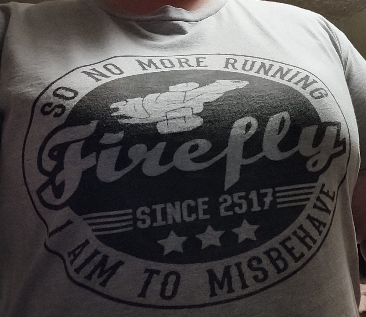 jztkddng's tweet photo. Thought i pulled out a different shirt, but went to put it on & realized its my #Firefly shirt. I don't usually wear it because its a little more snug than i am comfortable with, but i decided i am going to wear it to work anyway. Its been that kinda week at work. #AimToMisbehave https://t.co/8Jb0DND4x2