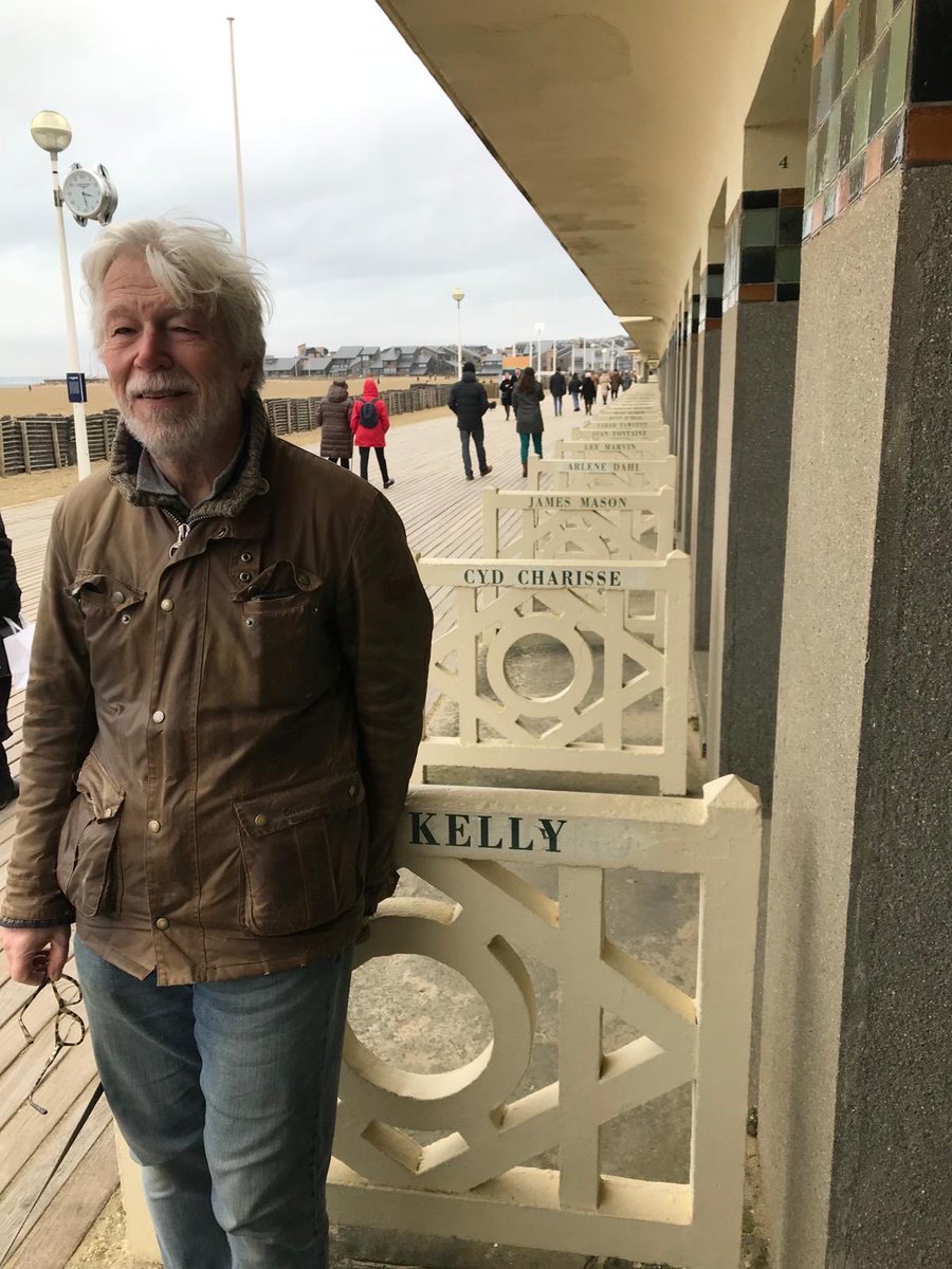 Fame at last. Happy to be close to James Mason and other stars in the line of Deauville’s bathing huts.