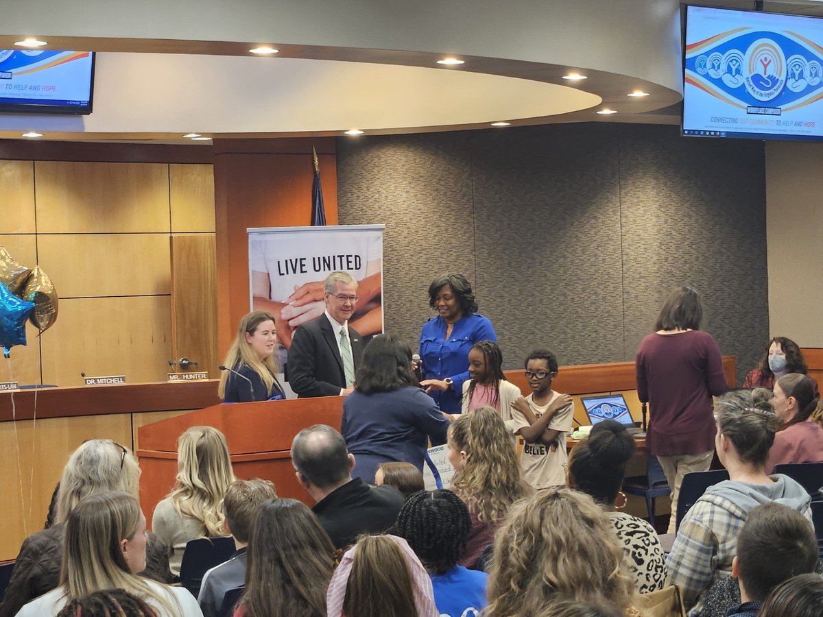 Greenwood raised $351.00 for United Way by holding a Student Led Art Show!  Victoria and Ma'rius presented the check during the United Way Celebration on Friday. #NNPSProud #GrowingGreatGators