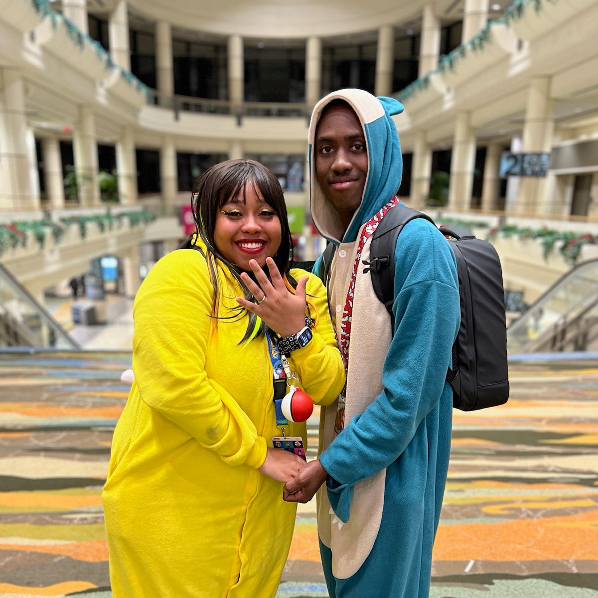MegaConOrlando's tweet photo. Pikachu, he chose you! And you said yes 💍 

From the whole MEGACON Orlando team, massive congratulations to the happy couple ❤️ Thank you for sharing this incredible moment with us, we wish you nothing but the best. https://t.co/2SMIcAp4FN