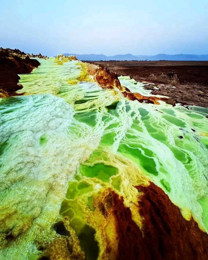 Dallol, DANAKIL Depression, Afar Ethiopia. This is the unique Dallol Colorful geothermal attraction, where you witness a live natural chemistry lab as extraordinary things unfold right in front of You. Join existing groups for a 2 nights and 3 days extreme nature adventure