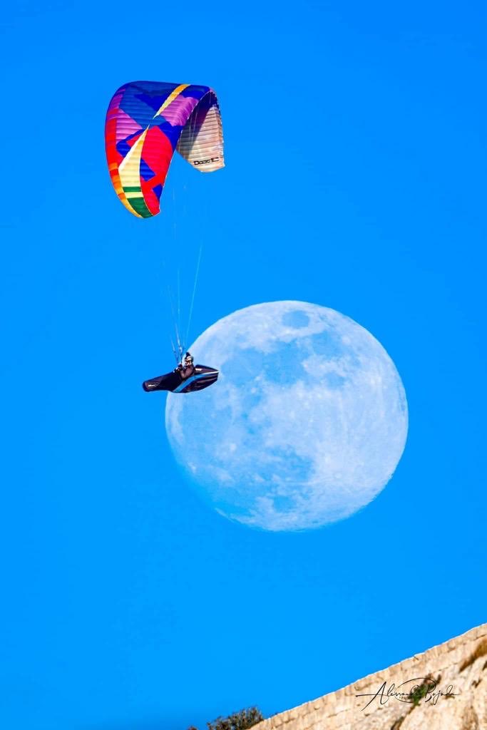 My partner paragliding above #Malta ❤️🌙 #SkiesofMalta