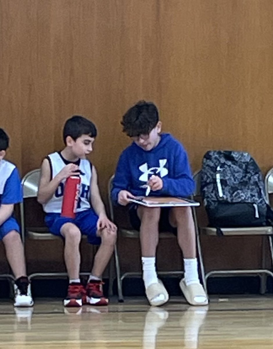 Proud mom moment.. Game got tough. AJ pulled out the clipboard and immediately helped Joey with his defense. #proudmom #basketball #orangetownny #tappanzee #brothers