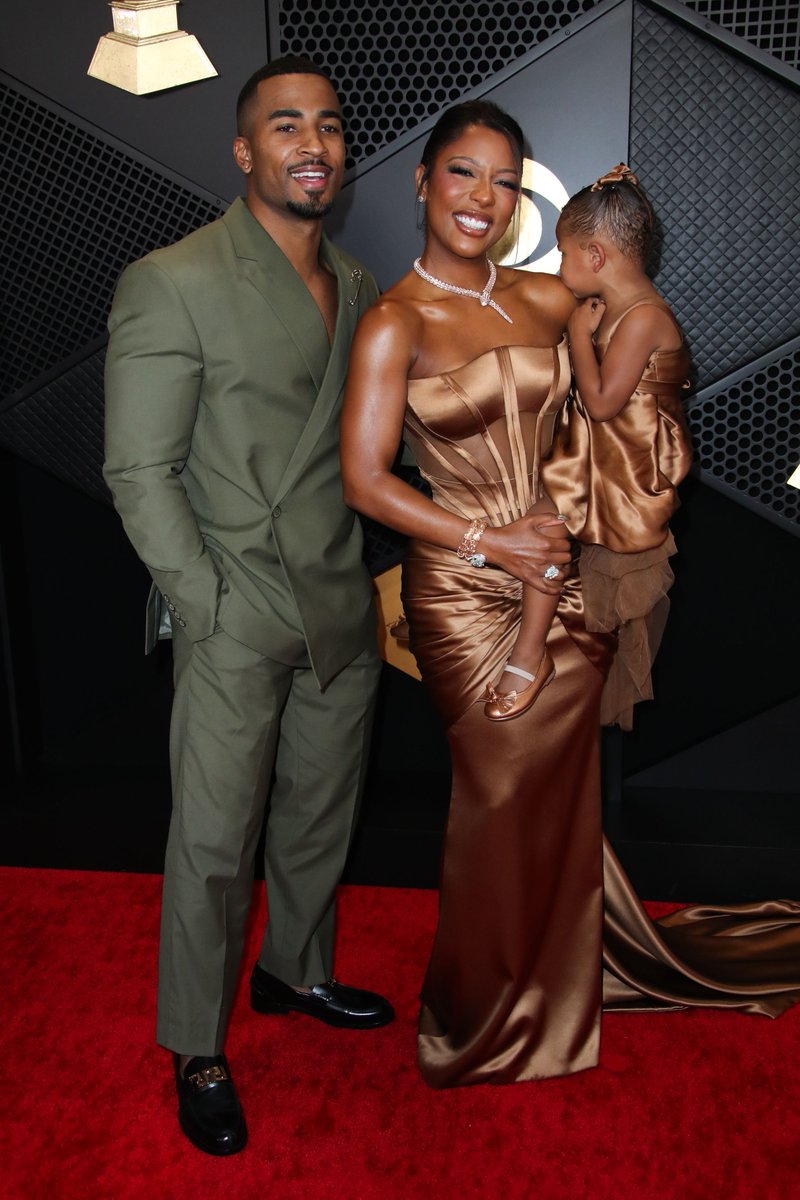 John Gaines, Victoria Monét, and Hazel Monét Gaines attend the 66th #GRAMMYs