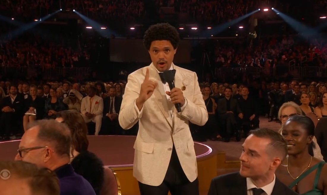 #GRAMMYs host Trevor Noah on Taylor Swift: “I think it is so unfair how NFL fans have been complaining about the cameras panning to Taylor Swift, like she’s controlling the cameras at the game.”