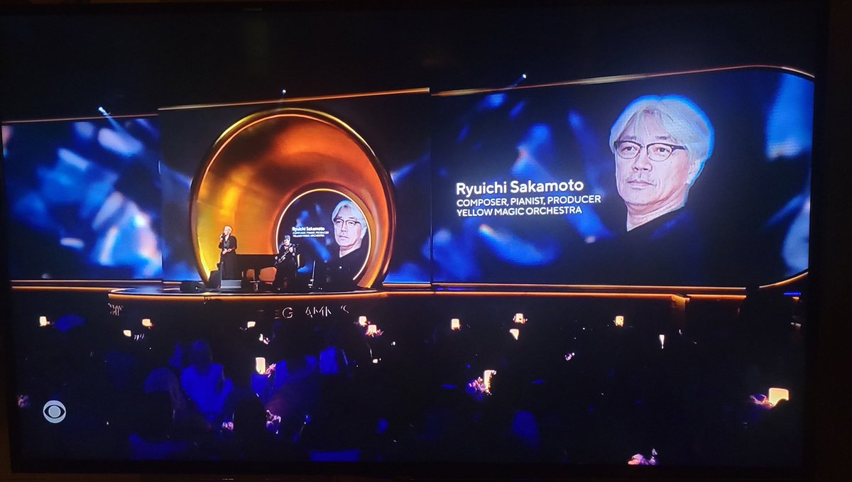 NanteJapan's tweet photo. Ryuichi Sakamoto was remembered during tonight's #Grammys

#RyuchiSakamoto #坂本龍一 https://t.co/Za6lQPl9Ep