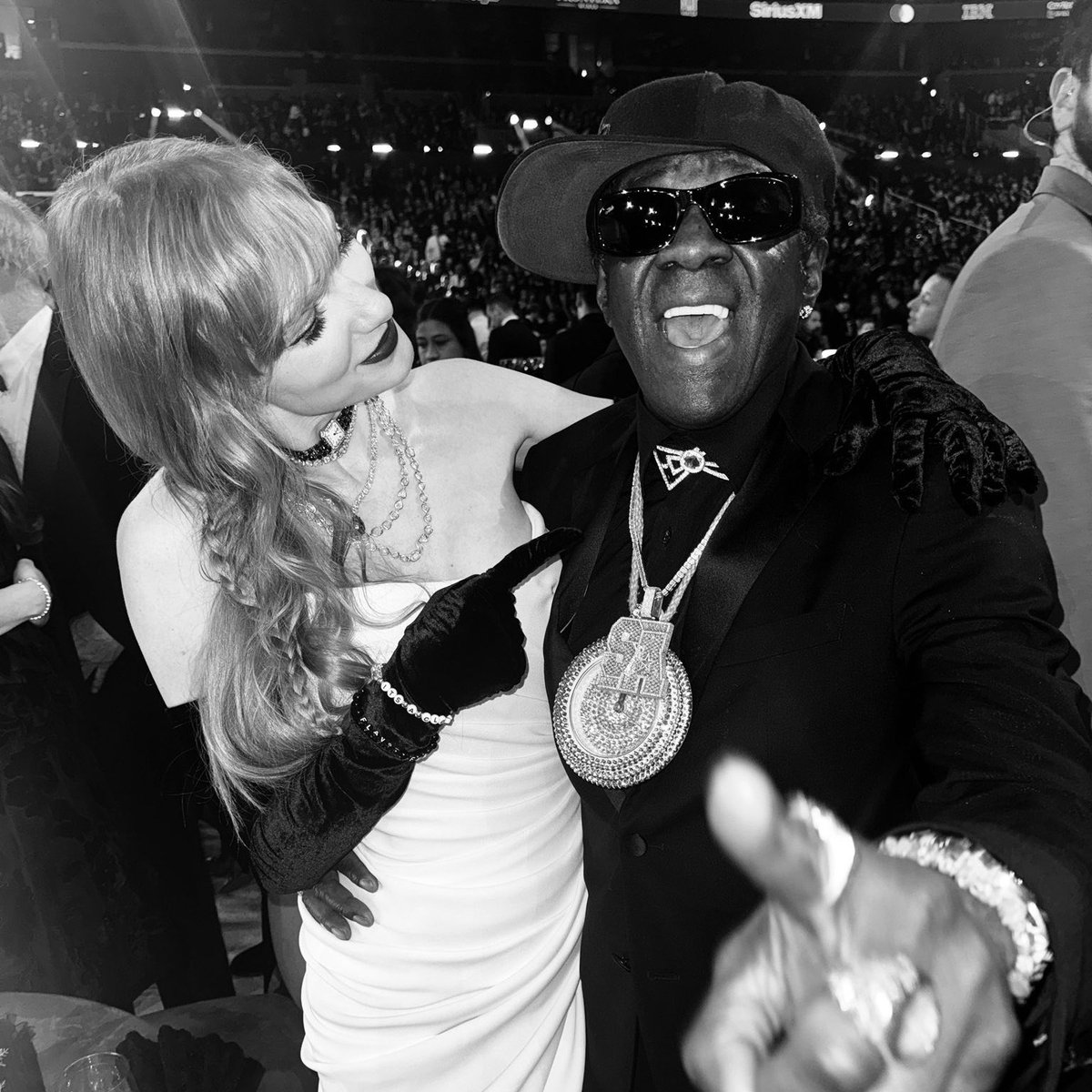 tswifterastour's tweet photo. 🚨| Taylor Swift and Flavor Flav stun at the 2024 #GRAMMYs! https://t.co/vvAXNA7gB5