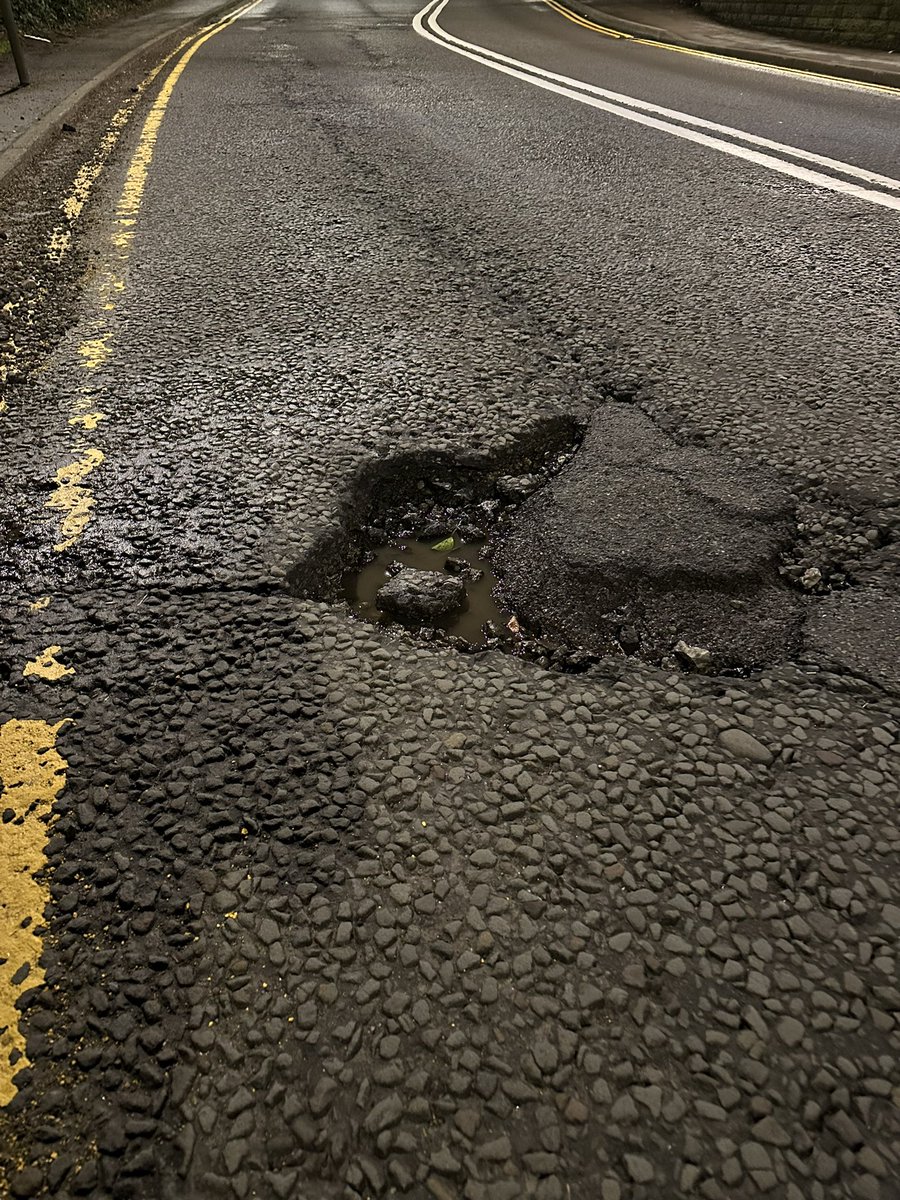 stevieweemanw's tweet photo. @cardiffcouncil this pothole needs urgent attention. On main road just past entrance to Pughs Garden Centre in Radyr. Road surface terrible at the best of times! #radyr #pothole https://t.co/1uZxJDuxqH