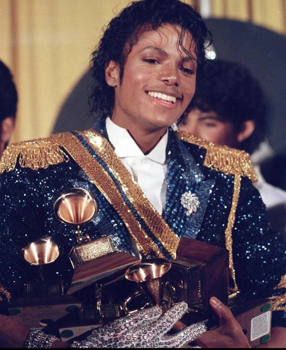 Still to me, the most interesting and legendary Grammy photo in music history. 8 awards in one night. #MichaelJackson #EpicRecords