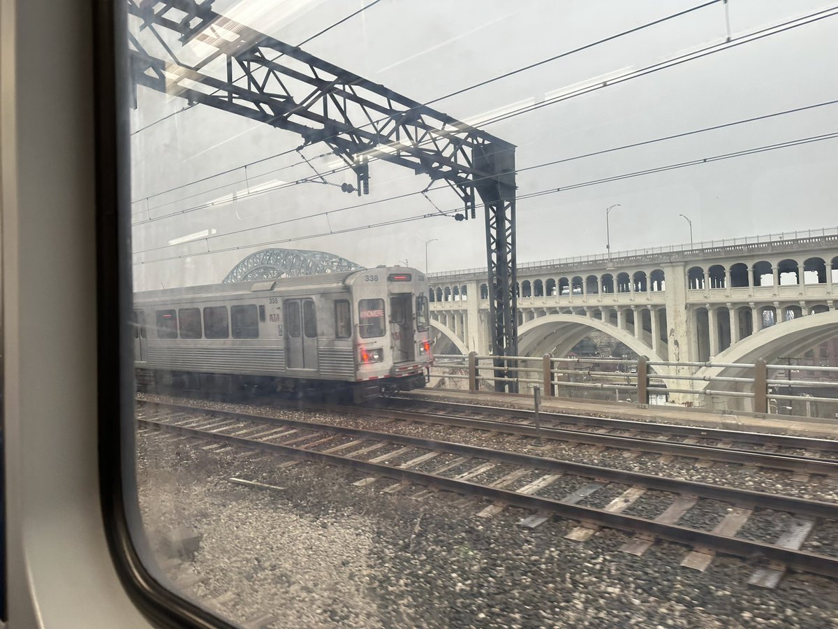 chrisronayne's tweet photo. Views of the bridges over the Cuyahoga from the Red Line @GCRTA never get old. Next week is Transit Week in Ohio. But it’s every week in #CLE #IGoRTA https://t.co/Ny4Ft2PvgE
