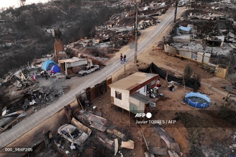 Wildfires scorch central Chile, death toll tops 110.
📷 Javier Torres #AFP