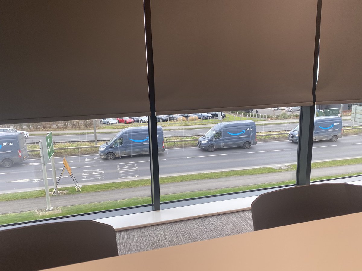 kerryowston's tweet photo. Lunch hour goal complete. I captured a convoy of @amazon Prime vans. https://t.co/dT1dYNzXKq