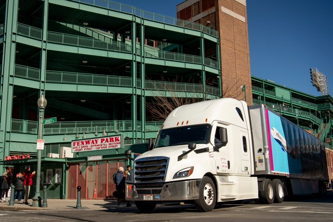 A truck destined for Boston Red Sox Spring Training in Fort Myers departs Fenway Park.