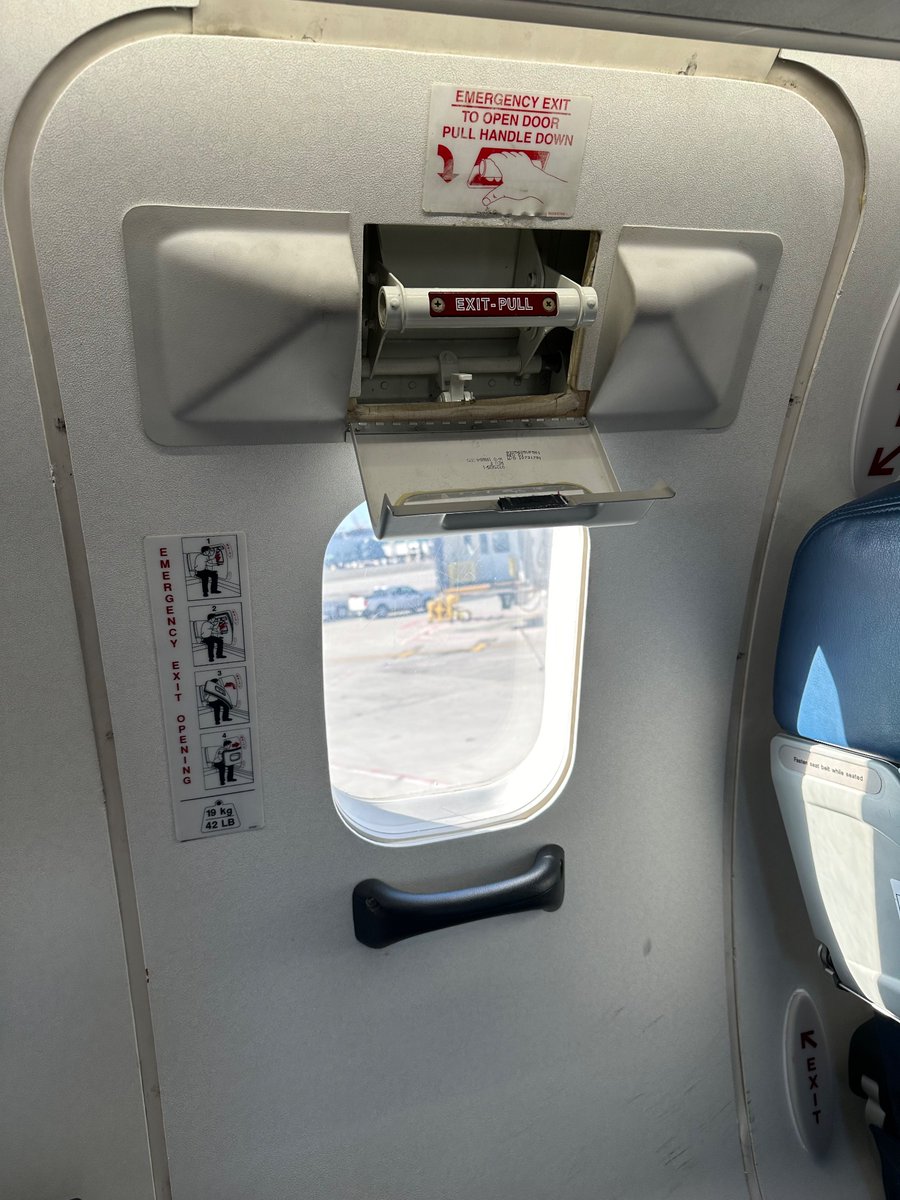 Coffee_lover249's tweet photo. @Delta fix your planes!! For as much as you charge should your equipment be in better repair!

The 1st leg of my journey had a plane with two restrooms- one was out of order with duct tape across the door and a message in sharpie. 

This is flight 2 - exit handle won’t stay shut! https://t.co/n7Cn8gZe9O