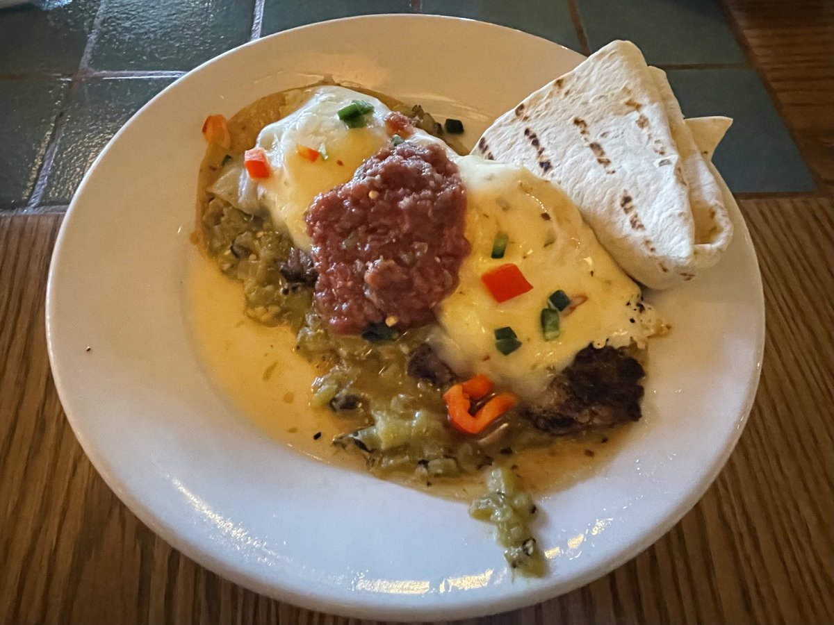 HootieMcOwlface's tweet photo. If you’re ever passing through #GallupNM do yourself the biggest favor and stop for a meal at the #ElRanchoHotel.
The Verde Eggs Benedict has Barbacoa in it… BARBACOA!!!😋
#Nomading 🚐 https://t.co/Hyu8v2J5l8