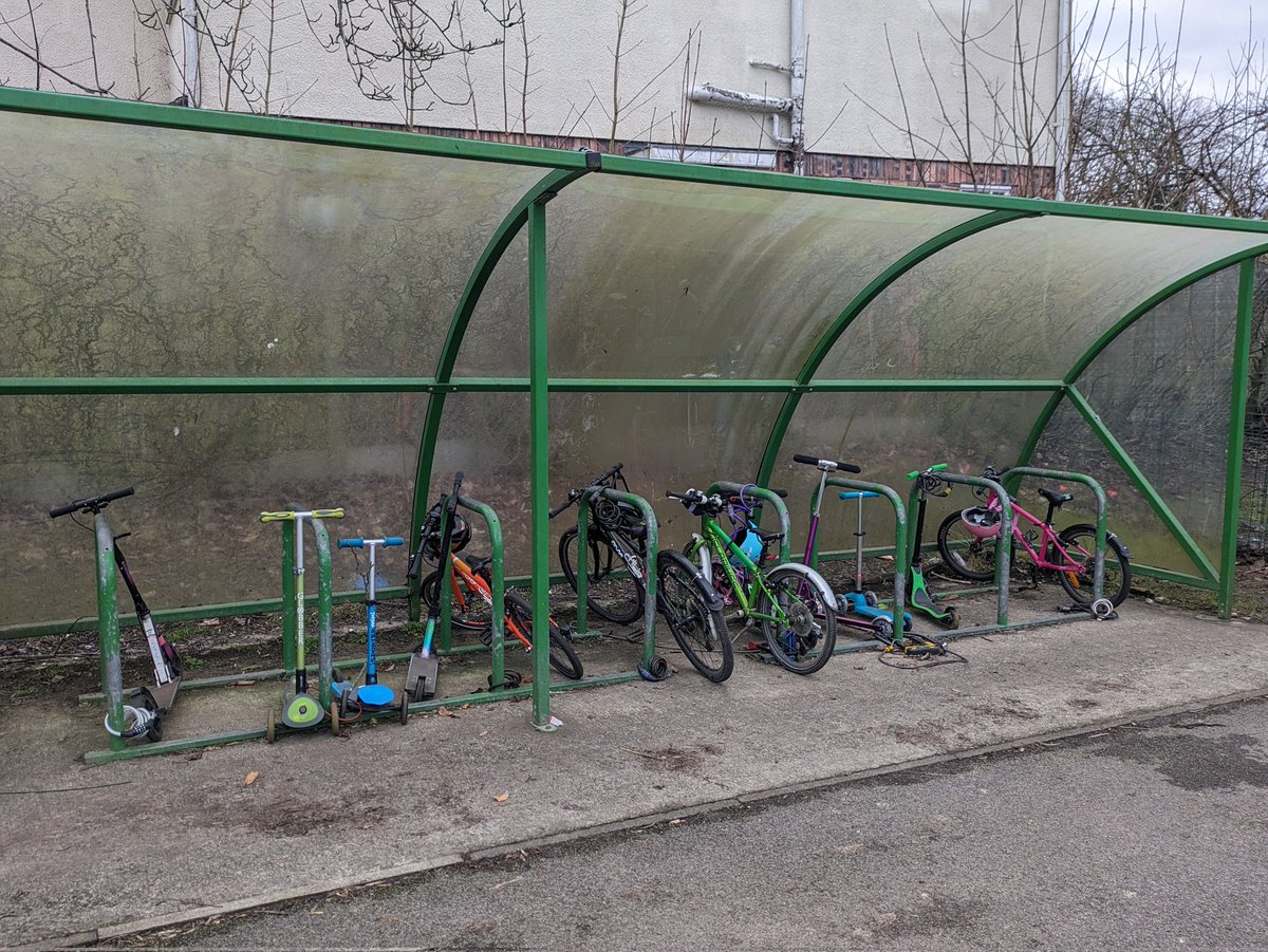 Definitely a lot more bikes and scooters parked up @BrookburnP since the #schoolstreet started . Until recently, we had one bike shelter that was generally part full. But look at this. In February too. Definitely more little legs enjoying pedalling and scooting the school run