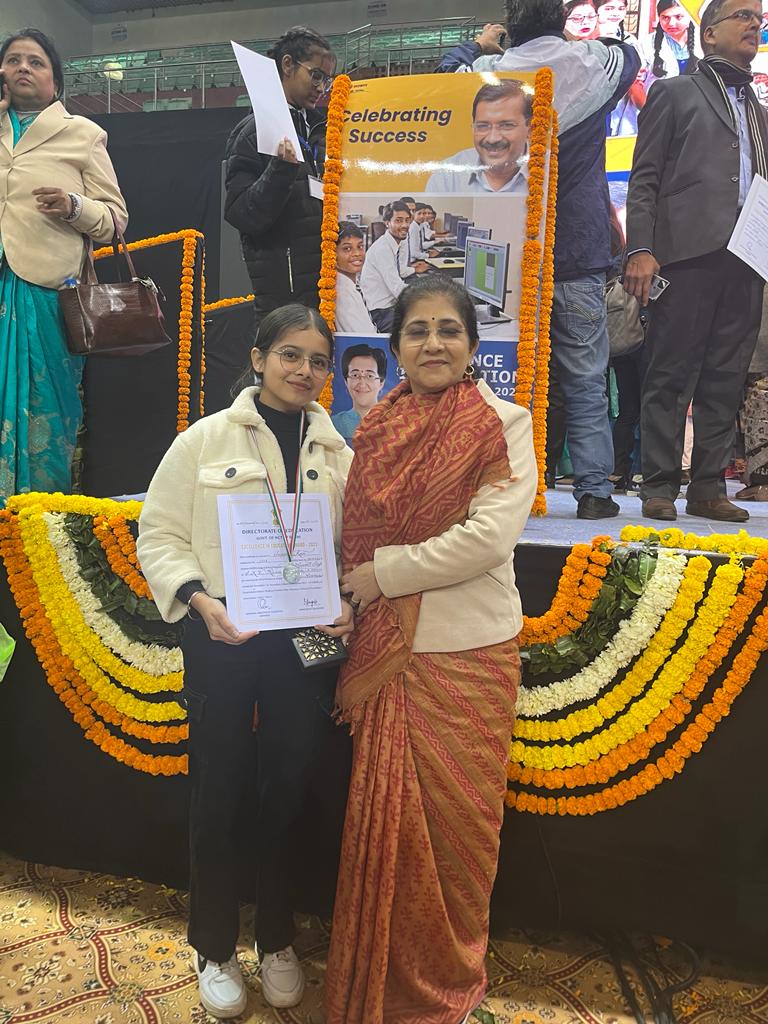 A proud moment for SKV RAJOURI GARDEN EXTENSION,1515021, on receiving an Excellence award to Ms.Jaspinder Kaur  for being the Zonal level topper in Commerce stream from honorable CM, Mr. Arvind Kejriwal and Education minister, Ms. Atishi !!