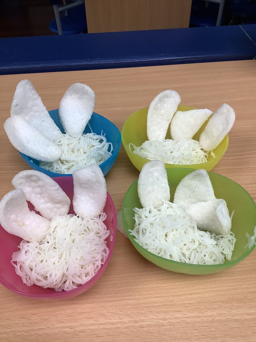 CPS_CClub's tweet image. Children trying something new in the After School Club, Rice Noodles flavoured with chicken and Prawn Crackers 🥢🇨🇳🥡 for Chinese  New Year