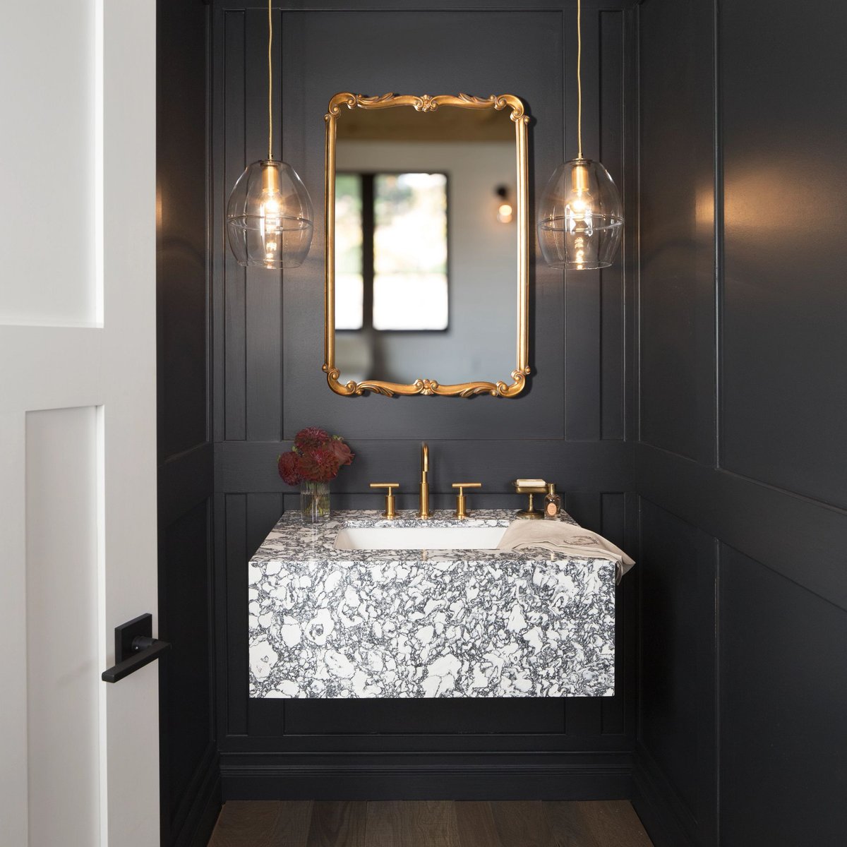 Do floating vanities catch your eye like they do ours?  The #MyCambria Rose Bay floating vanity is the centerpiece of this powder bathroom bit.ly/3tPaIRY. #wearecambria @cambriasufaces