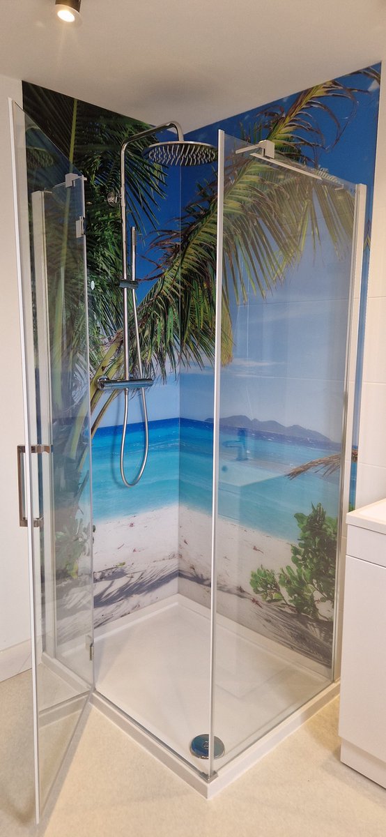 We love these customers photos of a finished printed shower panel order we recently completed! What a way to transform a space! #printedshowerpanel #acrylicsplashbacks #splashbackprinting #theprinthive
