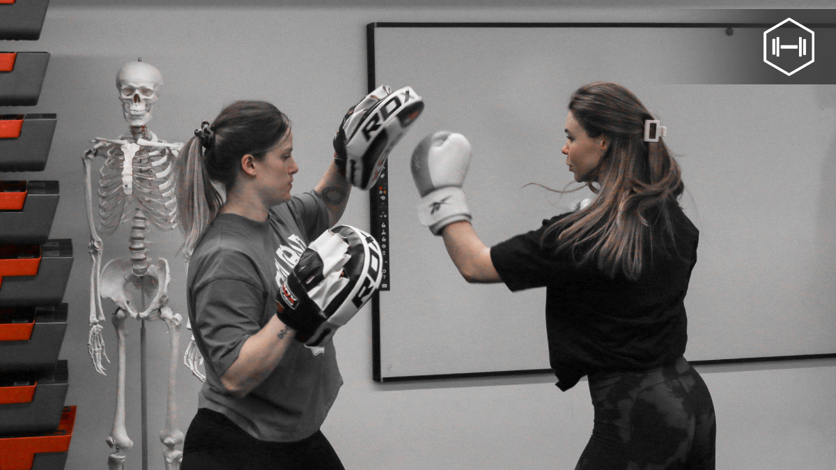 🥊💥 Uppercuts in padwork: more than a punch! They're your secret weapon for building core strength and nailing balance. Master the art of balance, one uppercut at a time! 💪🏋️‍♀️ #PadworkBenefits #CoreStrength #BalanceMatters