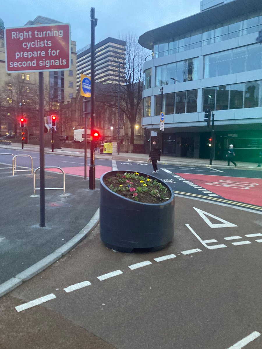 davidraraya's tweet photo. @ConnectingLeeds what's up with this flowerbed plonked in the lovely new cycle lane? It's pretty unsafe https://t.co/QqUQILdODK