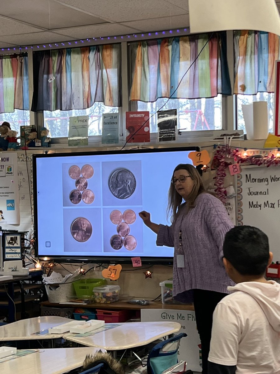 I modeled a Which One Doesn’t Belong today. 
The skills covered in this 10min lesson were: identifying coins and their value, counting money, adding money, we even created a bar graph and a line plot based on the amount of Pennies and nickels.