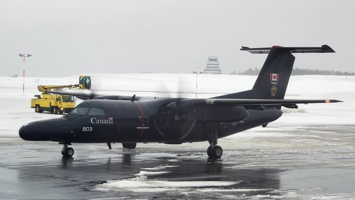 veryboeing's tweet photo. RCAF #DHC8 or military designation #CT142 from 17 Wing Winnipeg at CYHZ waiting for it's turn in deice facility https://t.co/vCbU72tOf4