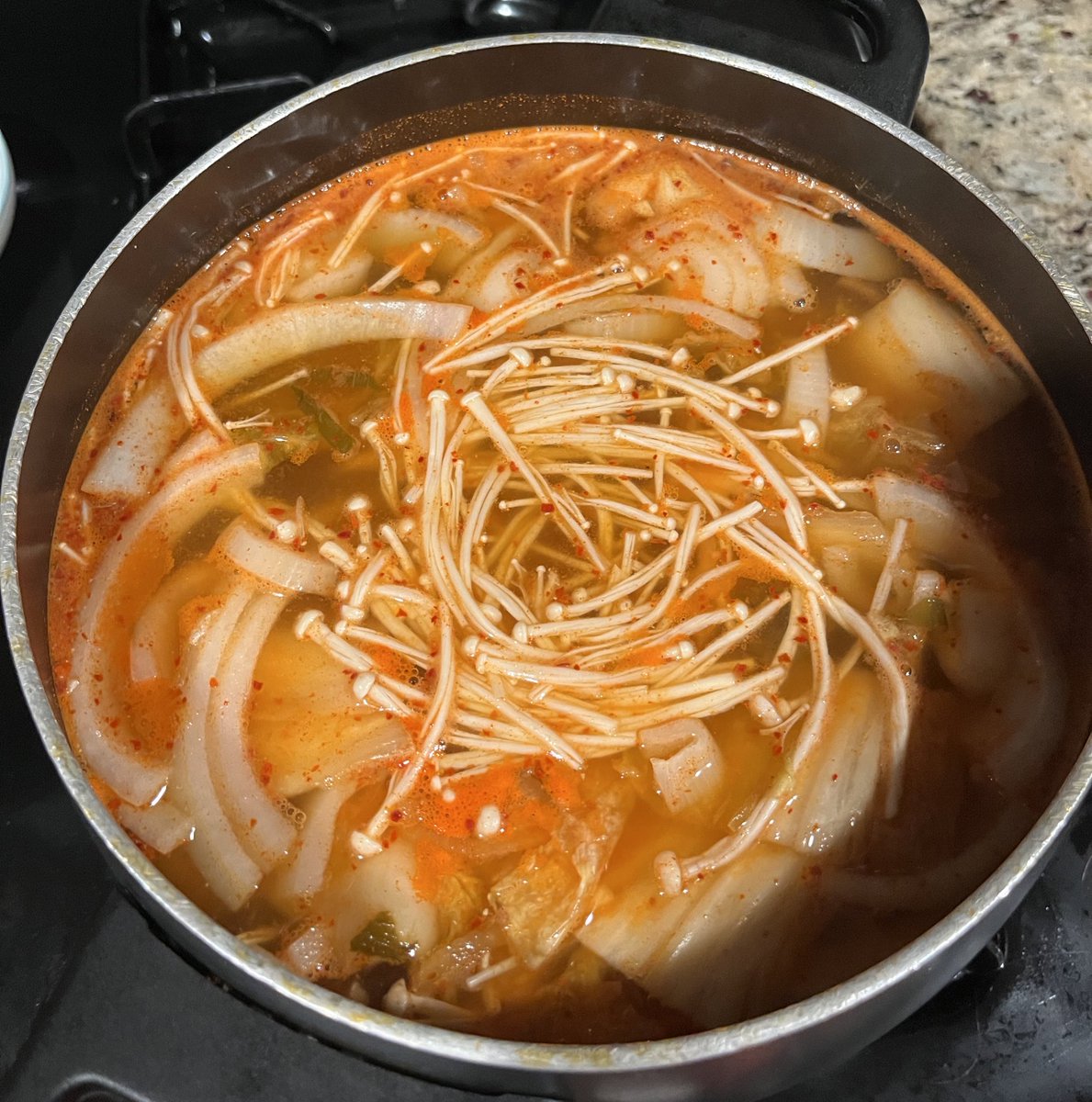 catboysuh's tweet photo. used the rainy day to take my first stab at korean army stew! #ChefAsh https://t.co/Gs2CuozoSP