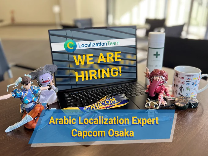 The image shows a workspace with a laptop open on a desk. The laptop screen displays a message saying "Capcom Localization Team - WE ARE HIRING!". The image also contains the text "Arabic Localization Expert, Capcom Osaka". Surrounding the laptop are various items and figurines: A Chun-Li figure, a miniature plushie of Lady Dimitrescu, an Umbrella badge with a Capcom lanyard, a Street Fighter pen, a Felyne from Monster Hunter, a Licker, First Aid Spray and Ink Ribbon from Resident Evil.