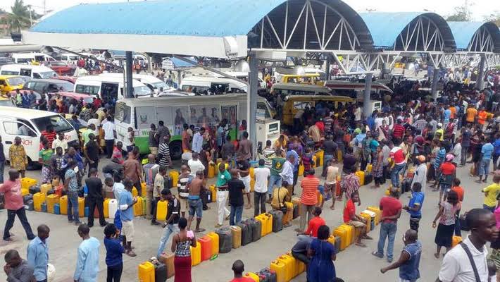instablog9ja's tweet photo. Fuel scarcity reportedly hits Lagos as long queues resurfaces  at Filling Stations https://t.co/YrFevac5Tk