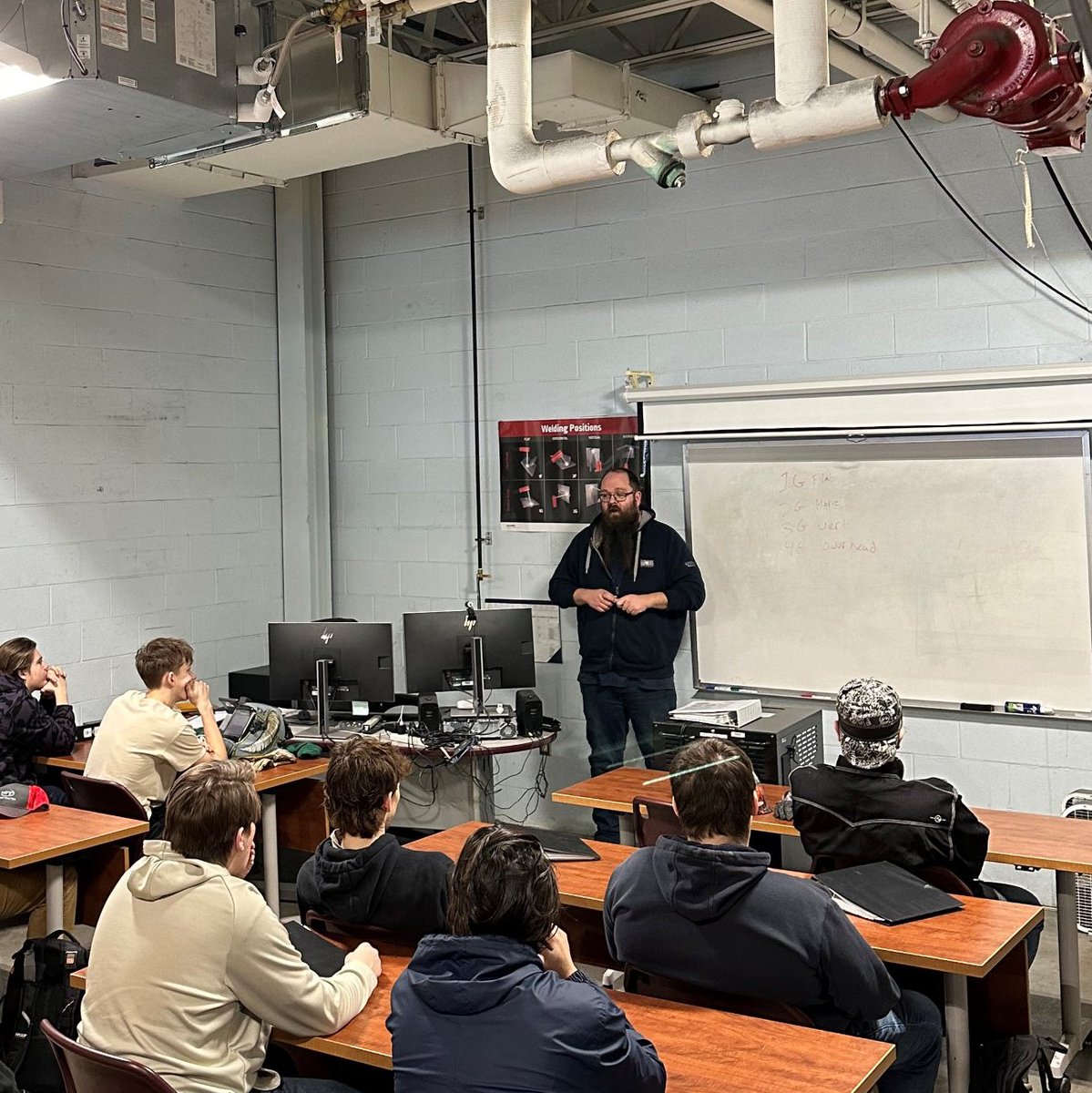 We'd like to thank Brandon Bentley of Haun Welding Supply and Cal Manning of the Haun School of Welding for visiting our senior welding class! Students learned what the American Welding Society Certification test consists of and received tips on new techniques to try in the shop!