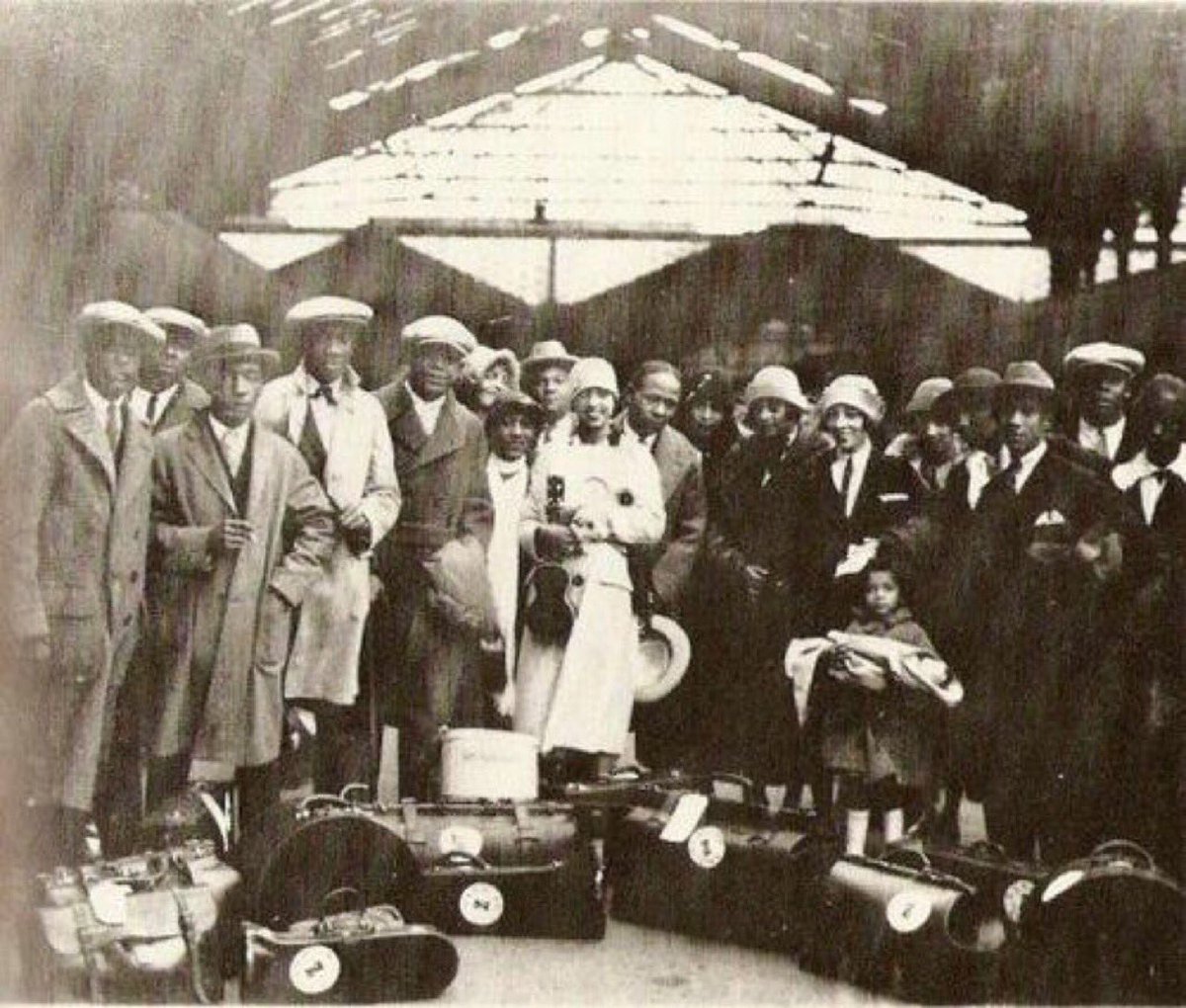 On September16 th 1925 the cast of “ La Revue Nègre “sails for France on the RMS Berengaria . This is a very rare photo of the Company arrival  September 22 at the port of Cherbourg .You can see glamorous Josephine Baker in the center “A Star is Born “and the rest is HERstory …