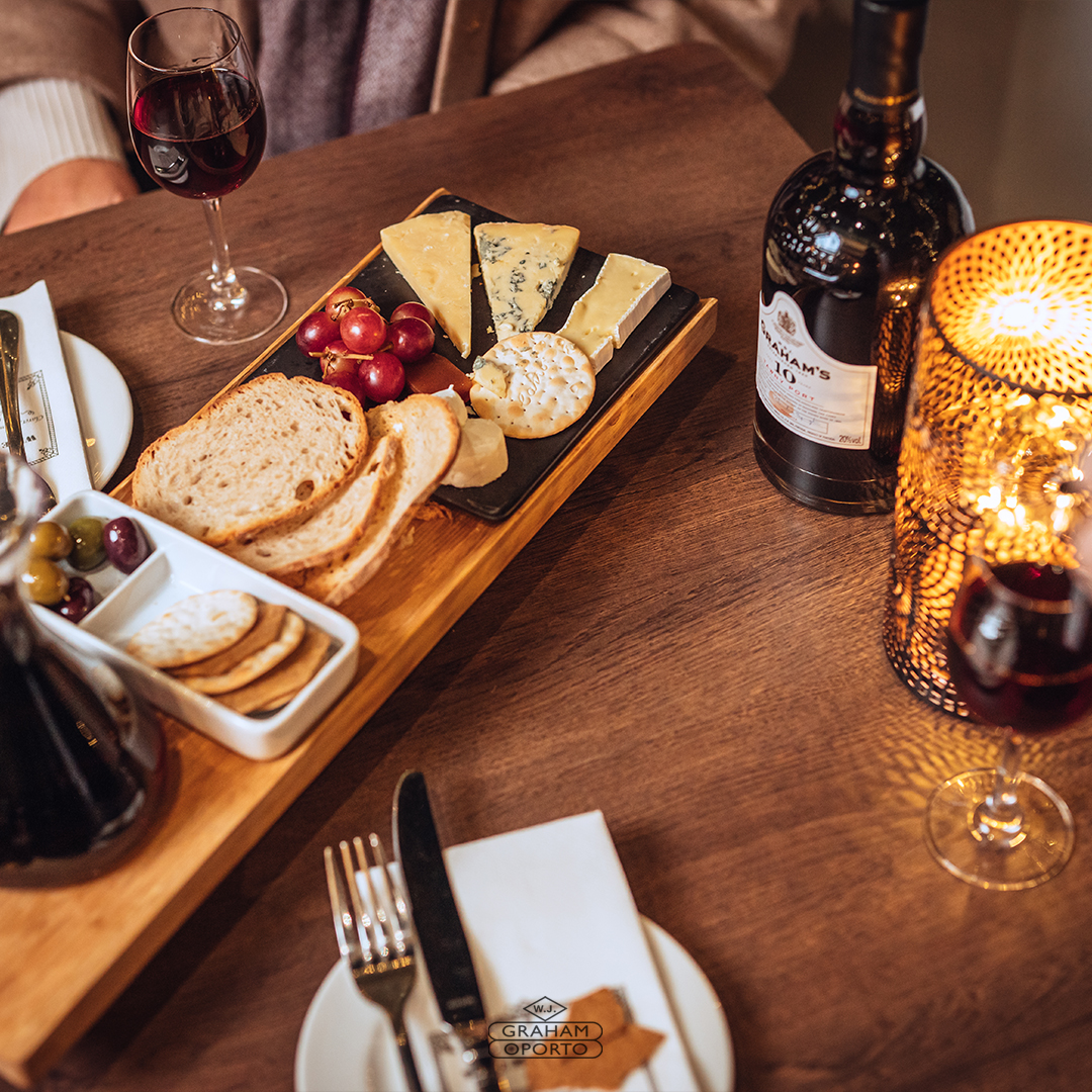 Cosy winter evenings are made for a cheeseboard and a glass of 10 Year Old Tawny. Whether you're snuggled up at home or out and about, treat yourself to a moment of peace. #GrahamsPort #Grahams