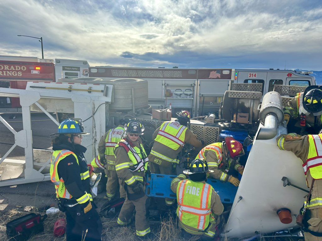 CSFDPIO's tweet photo. #ColoradoSpringsFire and #FalconFire are on scene of a rollover involving a semi trailer at the intersection of HWY 24 and Constitution Ave. Please avoid the area. https://t.co/U1soLci6x2