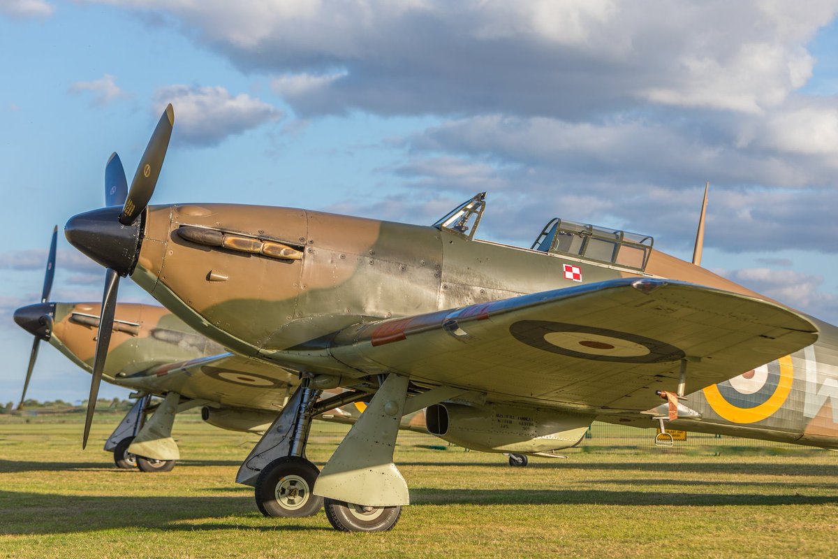 ShutterbugWGC's tweet photo. ‘Two for Tuesday’
On static display at the Duxford ‘In a Different Light: Battle of Britain’ photoshoot last September are the @FlightPolish G-HURI and Hurricane 501’s V7497…@I_W_M @IWMDuxford @DuxfordAirshows #hawkerhurricane #hawker #pegs #ghuri https://t.co/tP7hQIGYVO