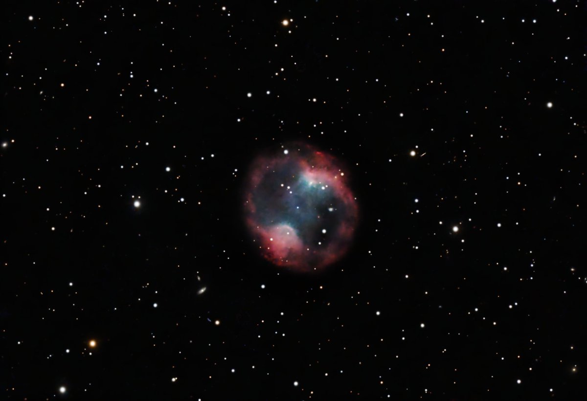 This is what a 'dying' star looks like. Some stars have violent ends with brilliant supernova explosions and some just lose their atmospheres into space, that is what's happening here. The Headphone Nebula! #photography #telescope #Astrophotography