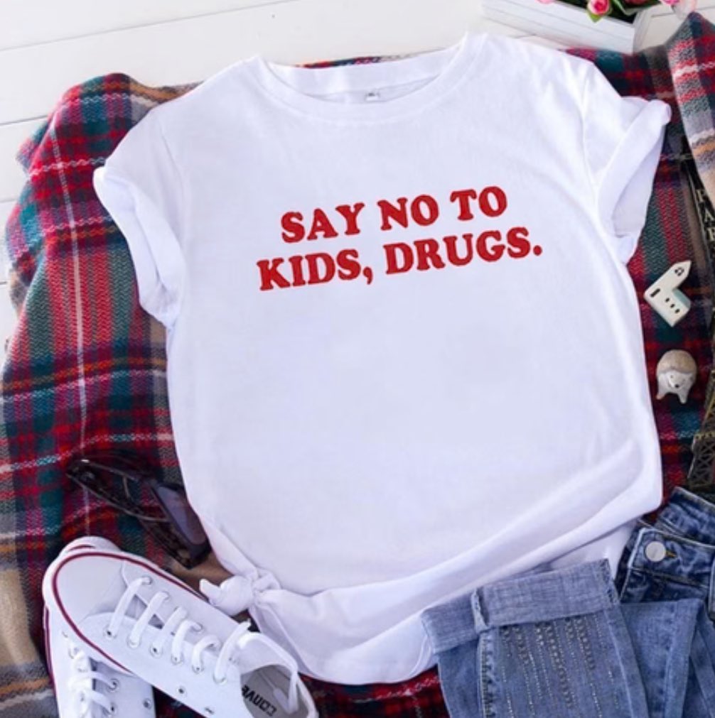 maia is wearing 

- white market “say no to kids, drugs” tee in white
   • $29.00

🔗: whitemarket.info/products/say-n…