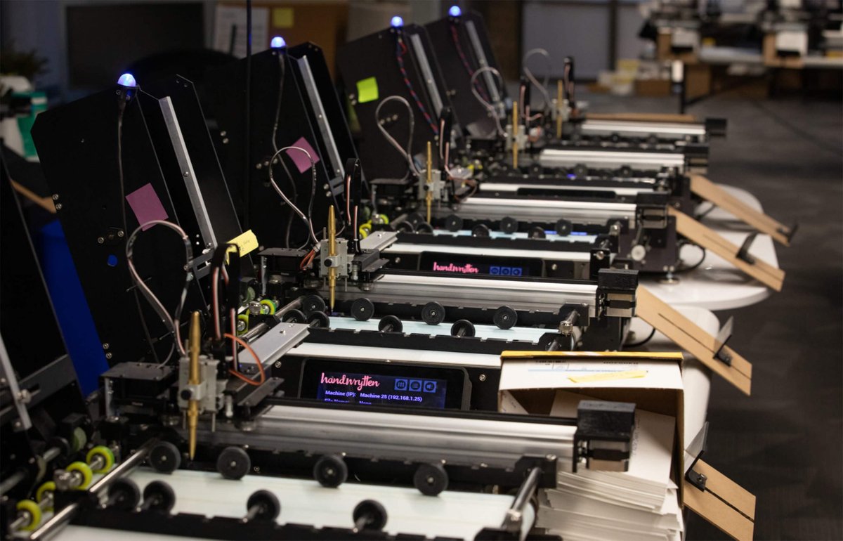 KennethCassel's tweet photo. there's a company that will send robotic hand-written notes on your behalf via api 

they have a fleet of robots that can write over 100,000 handwritten pieces of mail a day https://t.co/bnXfnT5J5w