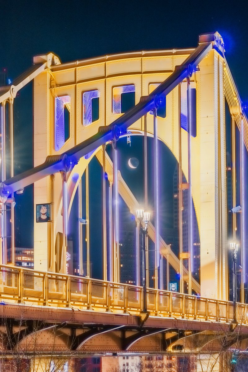 DaveDiCello's tweet photo. I've shared some big, dramatic views of the moon over #Pittsburgh in the last couple days, so how about a more subtle one? This is another view from yesterday with the moon perfectly framed in the Andy Warhol Bridge. Those lights are just so much fun to capture. https://t.co/m85gJbOk3p