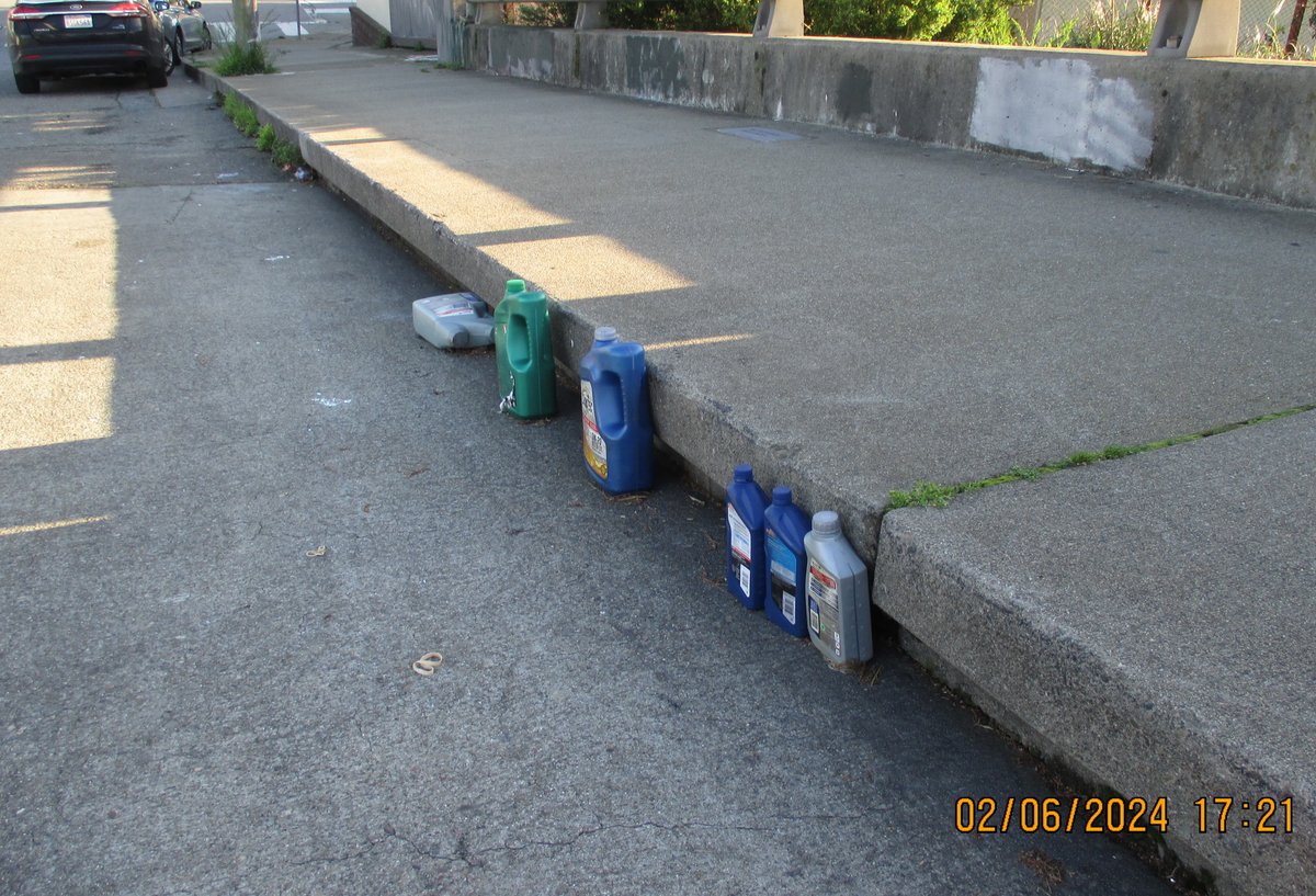 vegosapien's tweet photo. @SF311 Dumped used motor oil, on the Baden Street Bridge, south side, between Circular and San Jose. https://t.co/U1ua46gpYl