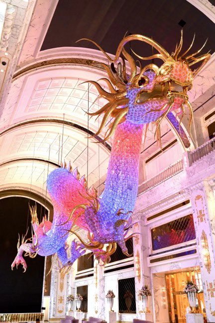 PCurtisSteelman's tweet photo. In honor of the auspicious Year of the Dragon, renowned architect Steelman unveiled several years ago an awe-inspiring creation at Imperial Pacific an amazing Crystal Dragon, meticulously designed exclusively for this remarkable year. Crafted with precision and artistry, this majestic sculpture stands as a symbol of power, wisdom, and prosperity, embodying the essence of the dragon in every facet. Its crystal scales shimmer with iridescent hues, casting a brilliant radiance upon all who behold it. The Crystal Dragon, a true masterpiece, serves as a testament to the fusion of tradition and contemporary innovation, making it a breathtaking centerpiece that resonates with the spirit of this exceptional year #steelmanpartners #casino #lasvegasbusiness #interiordesign #lightingdesign
