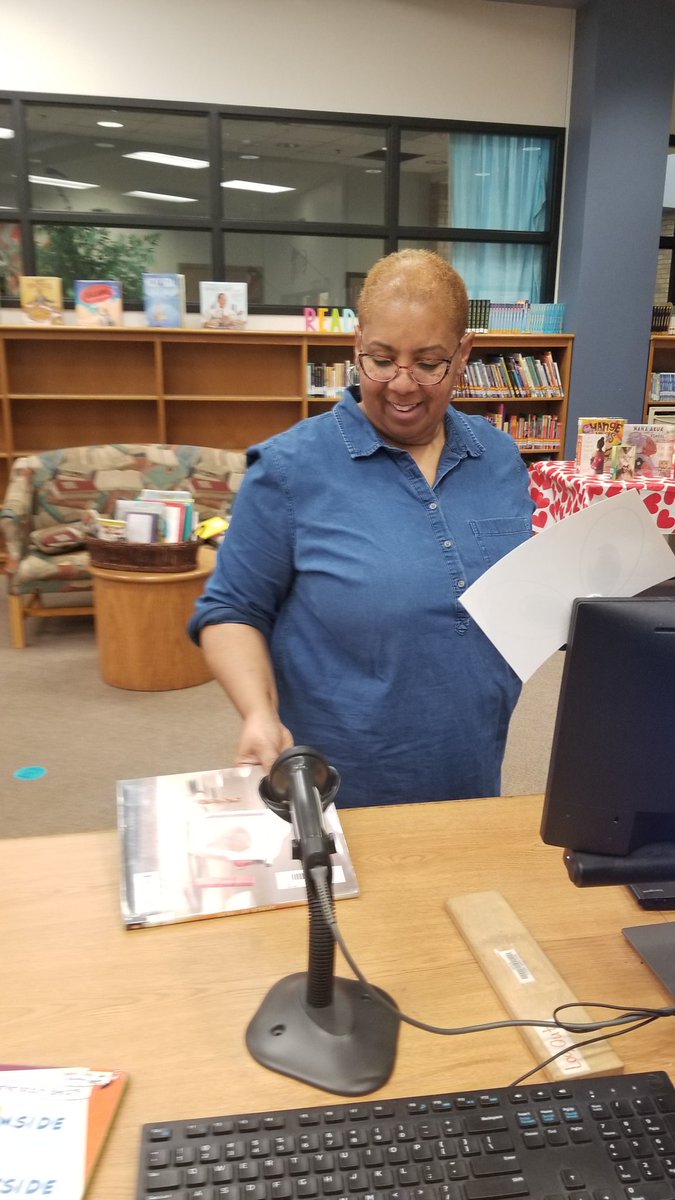 LANelsonLibrary's tweet image. Teachers checking out books for World Read Aloud Day!!!